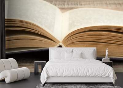 open book on a wooden table. Back to school. Education business concept. Wall mural