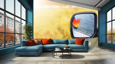 Yellow maple leaf on a car mirror autumn, sunlight, Wall mural