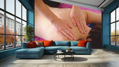 therapeutic back massage, drainage, training and practice, hands doing back massage Wall mural