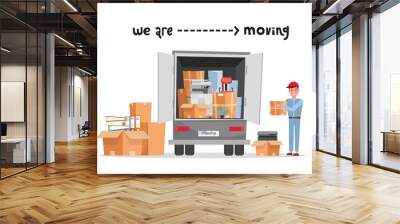 Man worker in uniform with cardboard boxes. Moving office. Transport company. Box in hand. Cute loader. Boxes with corporate things. Moving service. lettering we are moving. flat illustration Wall mural