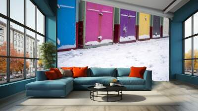 Beach huts in snow at Christmas Wall mural