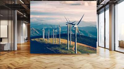 Vertical shot of the windmills in the wind farm Wall mural