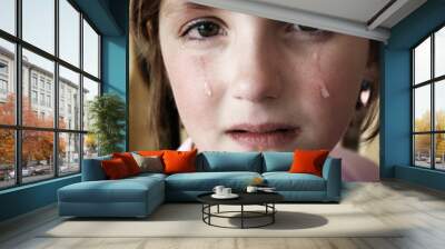 girl crying with tears on face cheek falling Wall mural