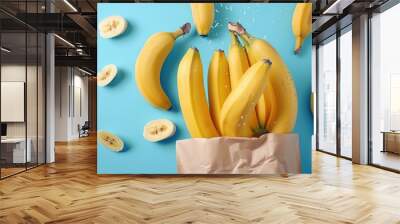 Fresh yellow banana. Blue background. Wall mural