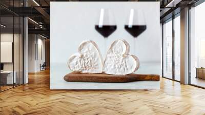 Soft heart shaped cheese and red wine glasses, Valentine Day concept Wall mural