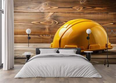 Construction helmet placed on wooden table, helmet, safety gear, construction site, protective, hard hat, workwear Wall mural