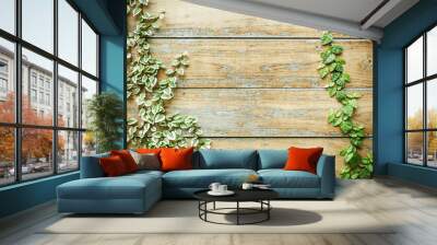 Texture background of the old wooden planks with climbing plant Wall mural