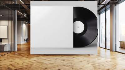 A blank vinyl record with a white cover, isolated on a gray background. Wall mural