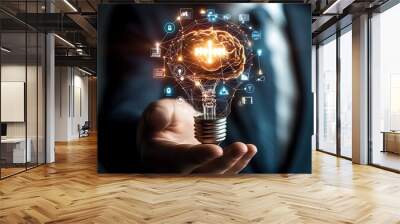 A businessman holds a lightbulb with a brain inside, surrounded by technology icons, representing innovation and ideas. Wall mural