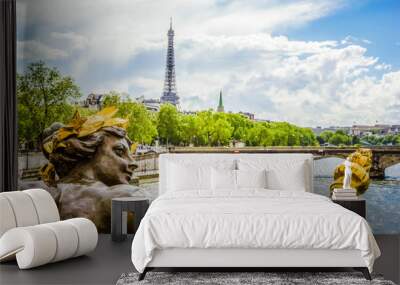 Beautiful view from Alexander III bridge with golden sculpture on Eiffel Tower and Seine River, Paris, France Wall mural