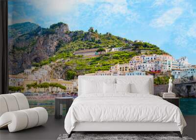 Panoramic view, aerial skyline of small haven of Amalfi village with tiny beach and colorful houses, located on rock, Amalfi coast, Salerno, Campania, Italy Wall mural