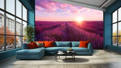 Lavender field at sunset light in Provence, amazing sunny landscape with fiery sky and sun, France Wall mural