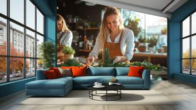 In a sunny kitchen, two women joyfully arrange fresh herbs, symbolizing creativity, collaboration, and the simple joys of cooking and companionship. Wall mural