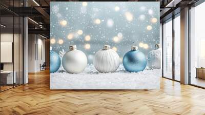 Blue and white Christmas baubles in snow with soft bokeh Wall mural