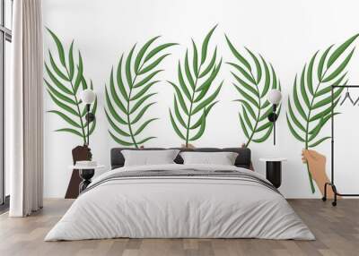 Hands holding palm leaves. Believers celebrate the Entry of the Lord into Jerusalem. Christian religious symbol of Palm Sunday holiday. Palm branch christian religious holiday symbol. Vector  Wall mural