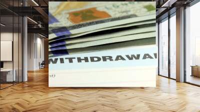 Withdrawal slip from bank checking or savings account - Finance and accounting concept Wall mural