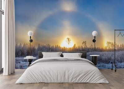 Cold winter day with a sun halo and sun dogs Wall mural