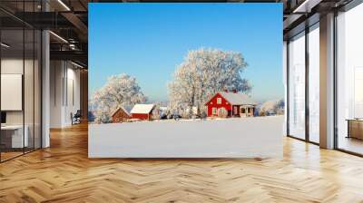 Farm in a beautiful winter landscape Wall mural