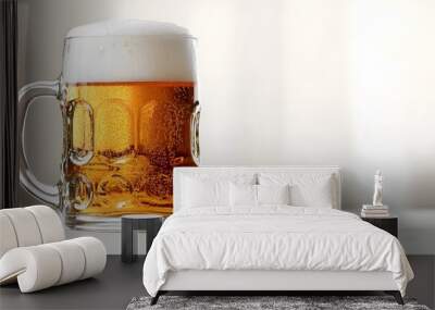 Photo of a mug with beer on a white background, side view for advertising and banner design Wall mural