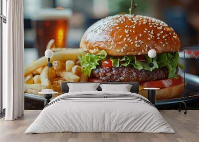 Closeup of hamburger and fries on the plate on table. Restaurant beef cheeseburger food meal, delicious unhealthy American fast or junk food Wall mural