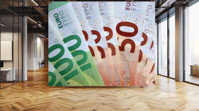 Many european euro money bills in chaotic arrangement. Pile of eur banknotes with different colors and condition Wall mural