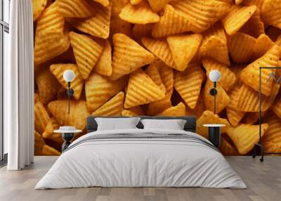 Processed collage of orange snack chips macro photo. Background for banner, backdrop or texture Wall mural