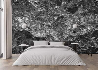 Processed collage of shiny metal silver gray foil crumpled packaging material texture Wall mural