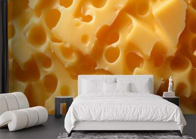 Processed texture of radomer or maasdam yellow cheese with large holes close up. Detailed photo of cheese surface Wall mural