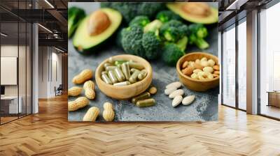 variety of healthy foods including broccoli, avocado, and nuts are displayed on a counter. Concept of health and wellness, as these foods are known to be nutritious and beneficial for the body Wall mural