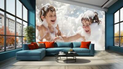 Kids are having fun at a foam party. Wall mural