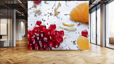 Winter Fruits Background - Pomegranate, Orange, Chai Tea on white Background Wall mural