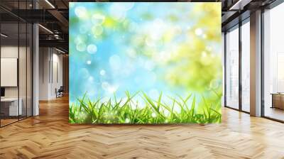 Abstract nature background of grass and blue sky in spring or summer season. Wall mural