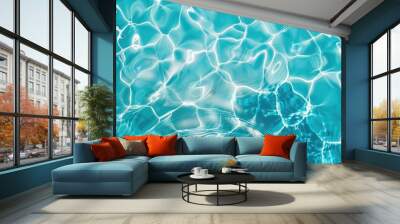 Abstract overhead view of empty swimming pool with crystal clear water surface and blue underwater pattern, devoid of any swimmers. Wall mural