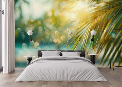 Blurred palm tree on sandy beach with tropical bokeh background, Summer travel theme. Blank space for text. Wall mural