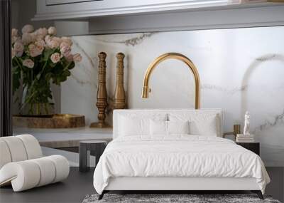 Detailed close-up photo of kitchen sink with gold faucet, marble backdrop, grey cabinets, and gold hardware. Wall mural