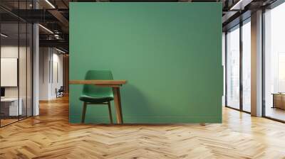 Empty room with wooden table, green chair, and empty background. Wall mural