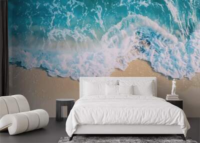 Gentle blue sea wave on pristine sandy shore Wall mural