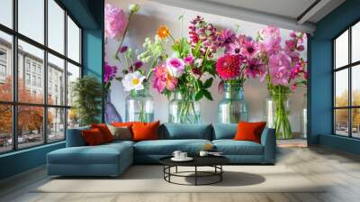 Home adorned with lovely flowers in glass vases Wall mural