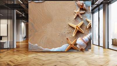 Seashells and starfish adorn sandy beach in a flat lay, perfect for adding text. Embrace the summer vibes. Wall mural