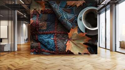 The coziness of autumn at home captured in an image of hot coffee, a quilt, and maple leaves on a dark background with room for text. Wall mural