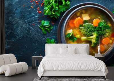 Vegetarian first course featuring a serving of vegetable soup with broccoli in a natural broth, suitable for keto or paleo diets, with space for text on top. Wall mural