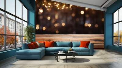 Wooden table with holiday lights in the evening Wall mural