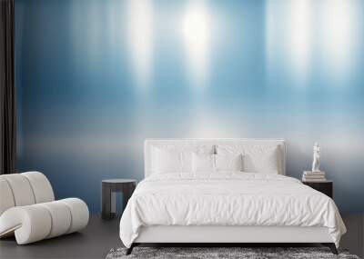 Abstract light blue blurred background with beautiful lighting spots and reflections. Wall mural