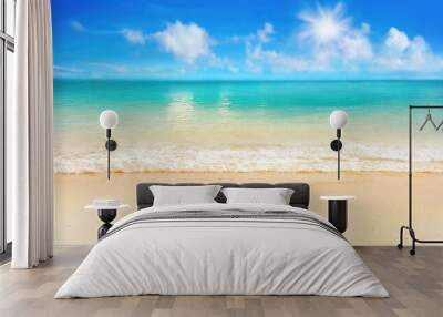 Beautiful background image of tropical beach. Bright summer sun over ocean. Blue sky with light clouds, turquoise ocean with surf and clear sand. Harmony of clean environment. Wide format. Wall mural