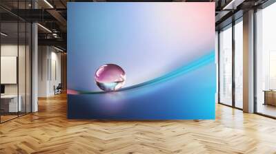 Beautiful clean transparent bright drop of water on smooth surface in blue and pink colors, macro. Creative image of beauty of environment and nature. Wall mural