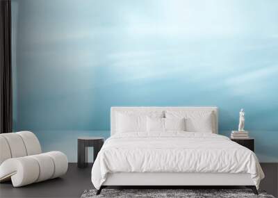 Minimalistic abstract gentle light blue background for product presentation with sunny light and intricate shadow on wall. Wall mural