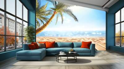 Summer  panoramic  landscape, nature of tropical beach with wooden platform, sunlight. Golden sand beach, palm trees, sea water against blue sky with white clouds. Copy space, summer vacation concept. Wall mural