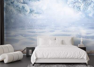 Winter christmas scenic background with copy space. Wooden flooring was strewn with snow in forest and branches of fir-trees covered with snow on the nature. Wall mural