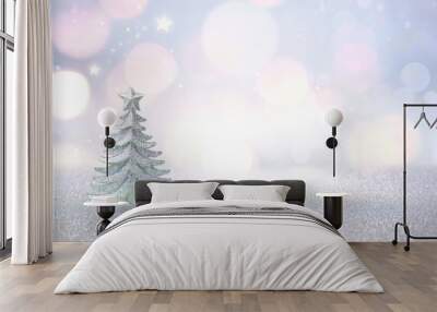 Winter christmas scenic background. Silvery small Christmas tree on a blurred snowy defocused background in blue and pink tones with copy space. Wall mural