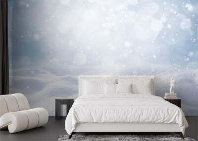 Winter snow background with snowdrifts, with beautiful light and snow flakes on the blue sky, beautiful bokeh circles, banner format, copy space. Wall mural